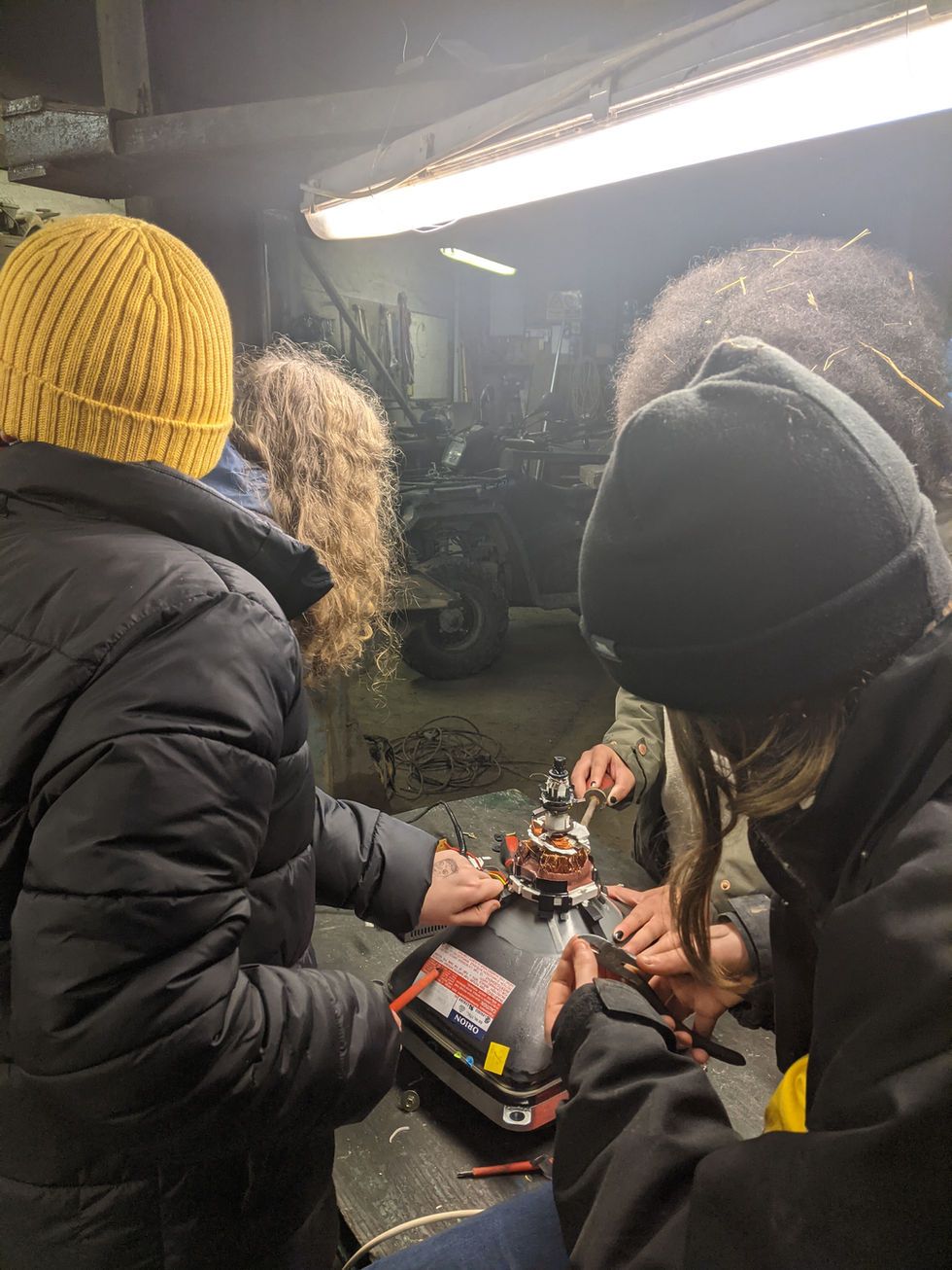 Young people working on practical projects together